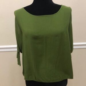 Green top with cut out sleeve Size Large.